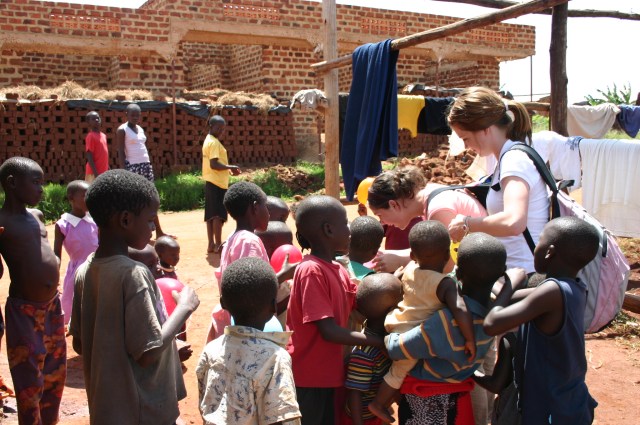 Just outside the meeting place in Kasokoso we started a "candy riot."  Danielle was a little nervous at first.