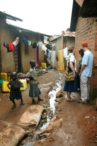 A typical walkway in Soweto: clothes, kids and sewage...