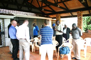 Praying over the meeting with the Kampala Urban Team church leaders.